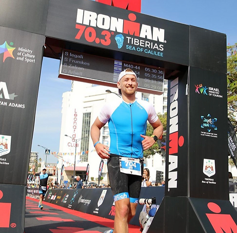 Gil Arbel finishing IRONMAN 70.3 Tiberias